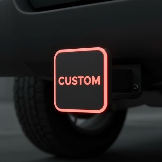 3D Printed square red LED hitch cover with glowing CUSTOM letters and sharp corners